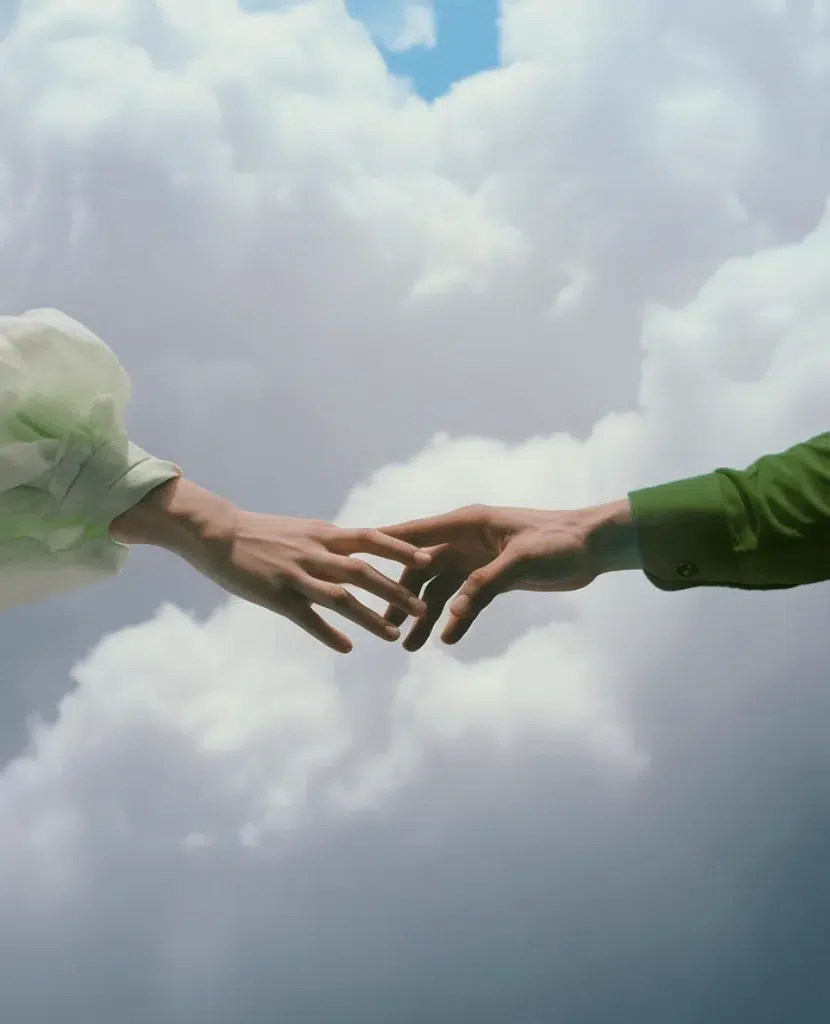 En esta imagen se ve unas nubes de fondo y unas manos que se van a separar para olvidarse en el uno al otro