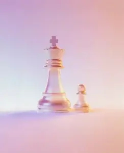 Aparece una reina y un peón de ajedrez, haciendo referencia al control que ejerce una madre narcisista